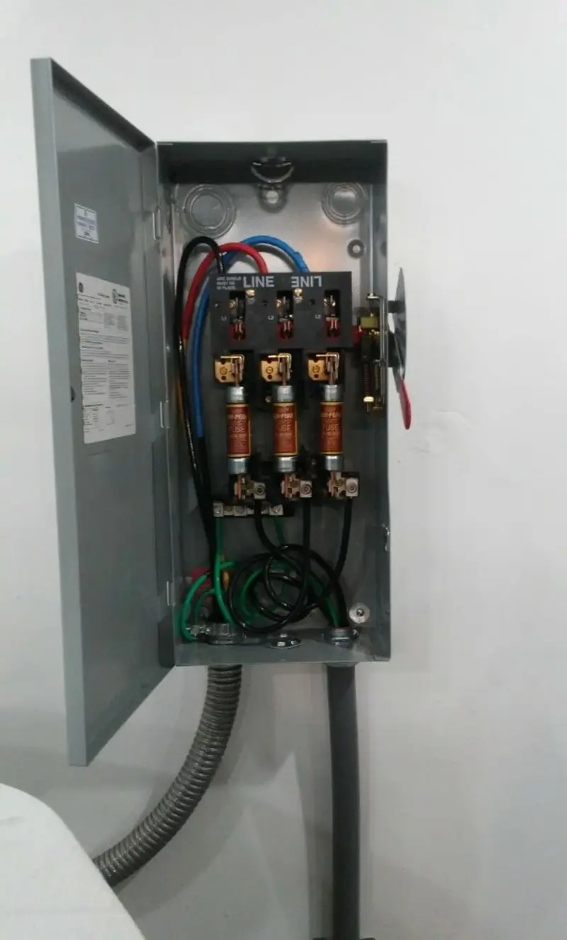 Three-phase disconnect switch installed for Smoke Detector Installation in Kansas City